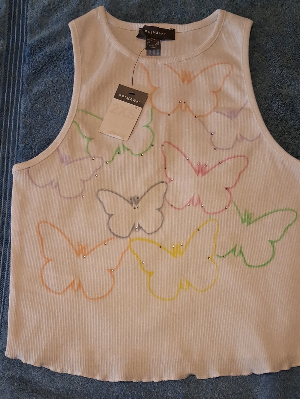 Primark White Ribbed Tank Top with Multicolor Butterfly Outlines.  '